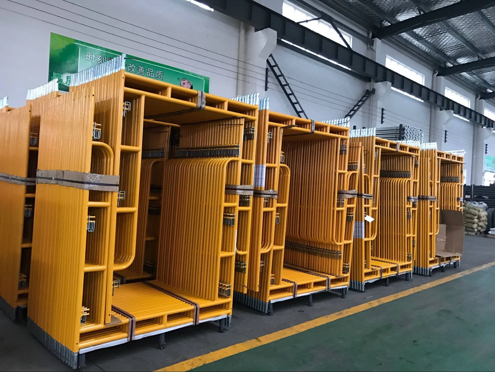 Painted frame scaffolding organized in the warehouse