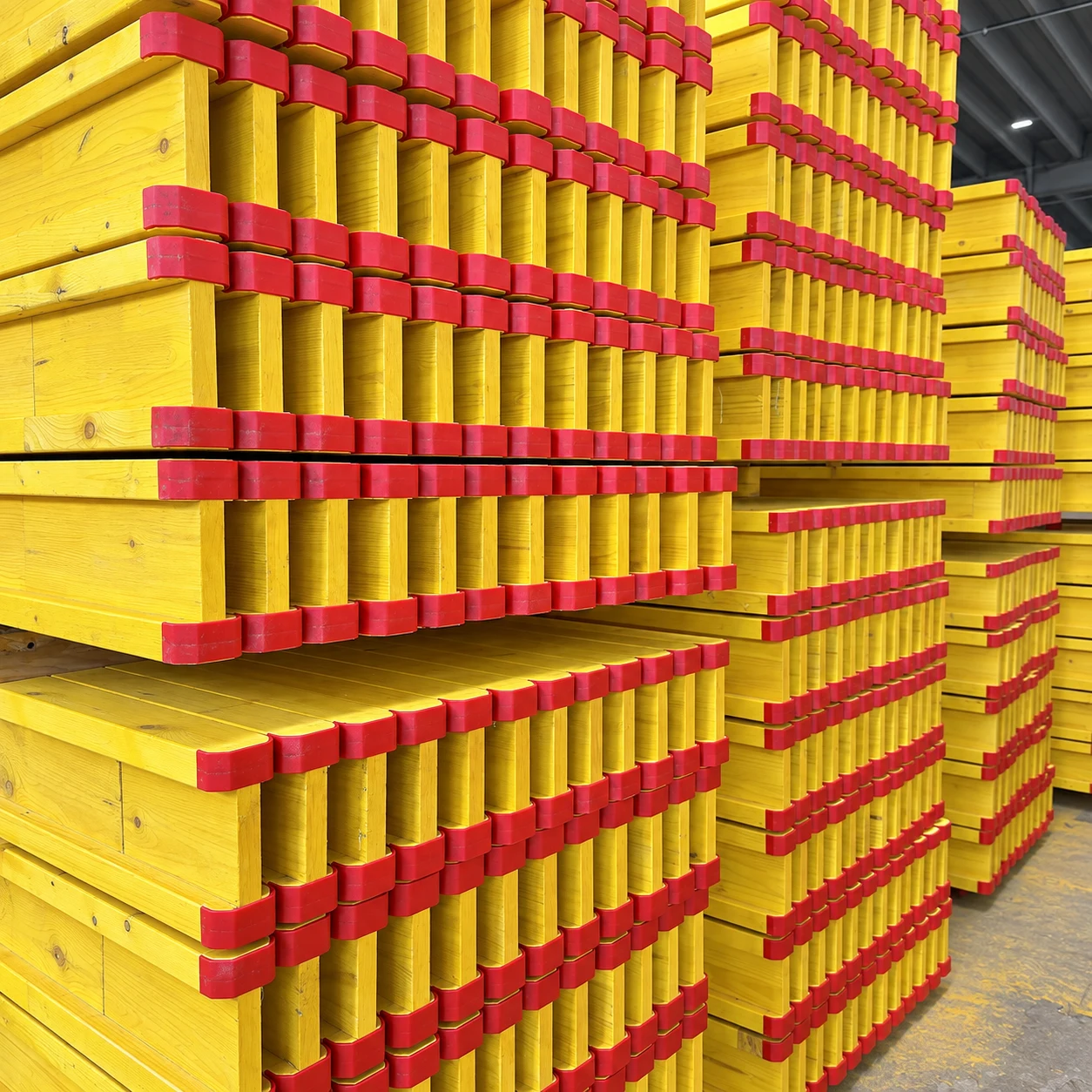 H20 timber beams with red protected ends in stock