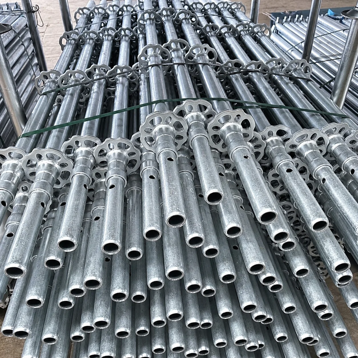 Ringlock standards with welded rosettes in finished inventory