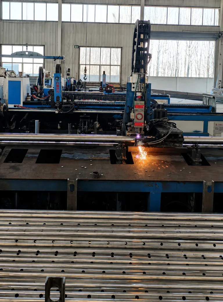 Steel tube cutting equipment operating inside the Hebei manufacturing base