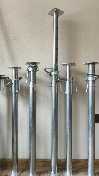 Galvanized steel props showing head plates and adjustment mechanisms