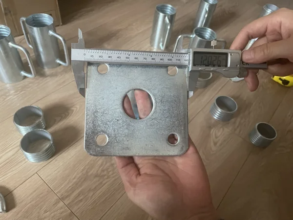 Square plate checked with a digital caliper