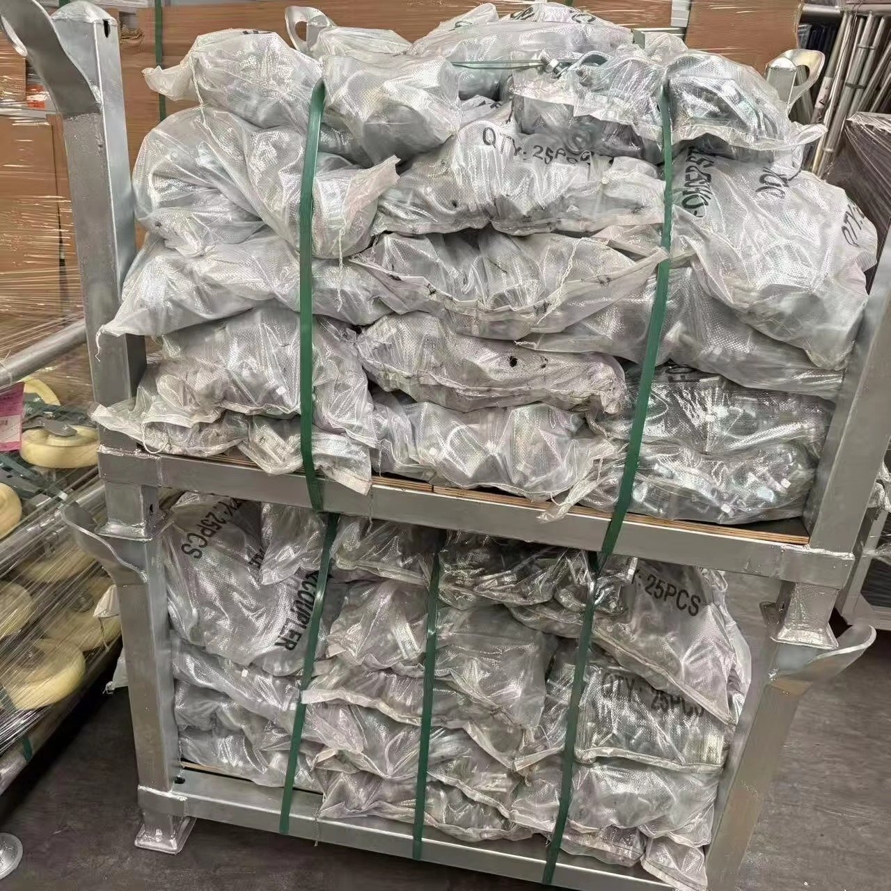 General scaffolding accessories packed in bags and secured in steel transport racks