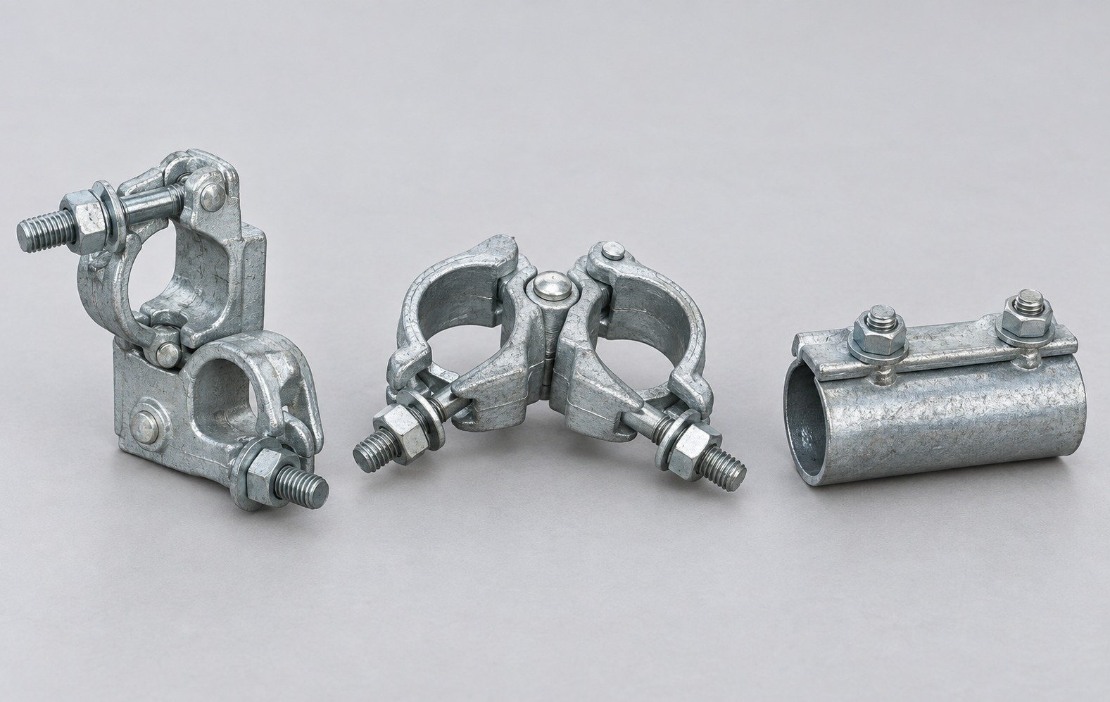 Representative galvanized scaffold coupler forms: right-angle, swivel and joint
