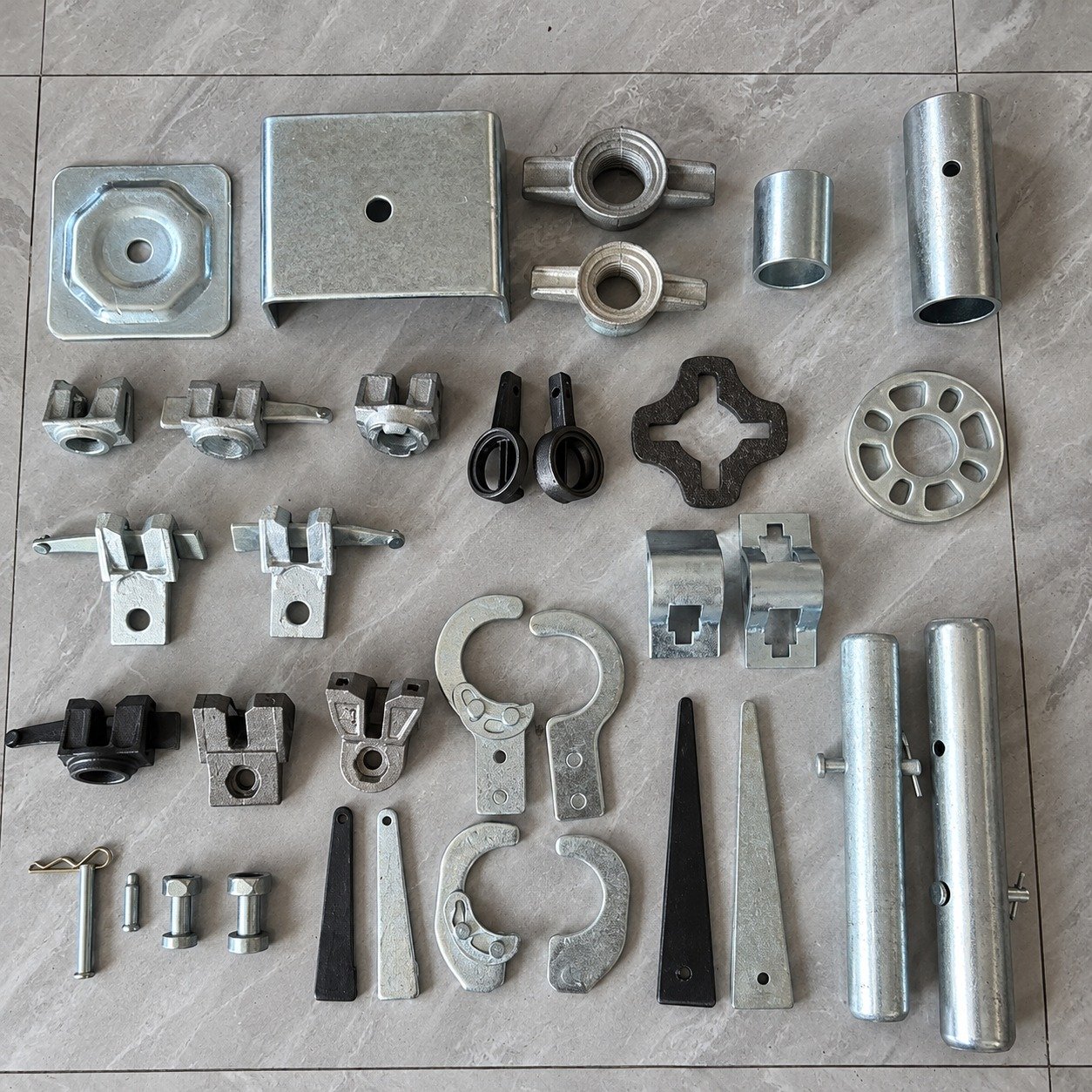 Scaffolding hardware components arranged for selection