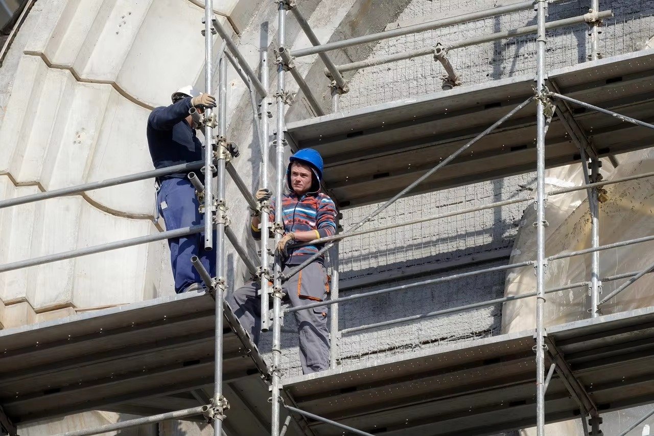 Scaffolding accessories supporting active construction work